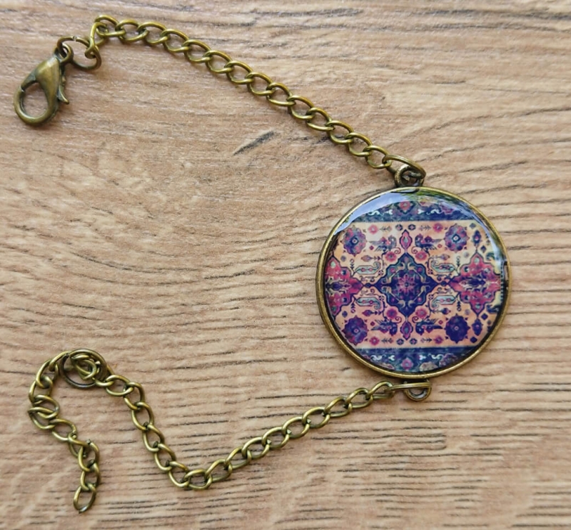 Rounded glazed bracelet with Armenian ornaments, by Anahit Harutyunyan