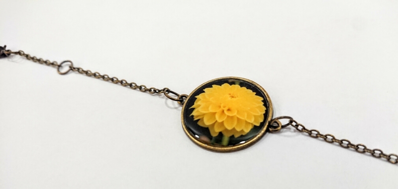 Rounded glazed bracelet with the image of flowers, by Anahit Harutyunyan