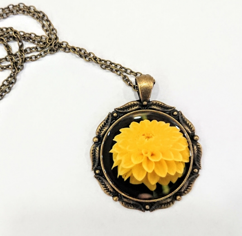 Rounded glazed necklace with the image of flowers, by Anahit Harutyunyan
